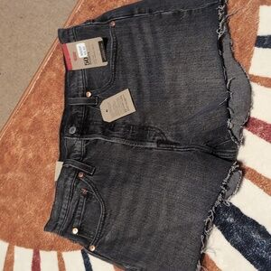 Levi's new with tags black jean shorts. Size 30